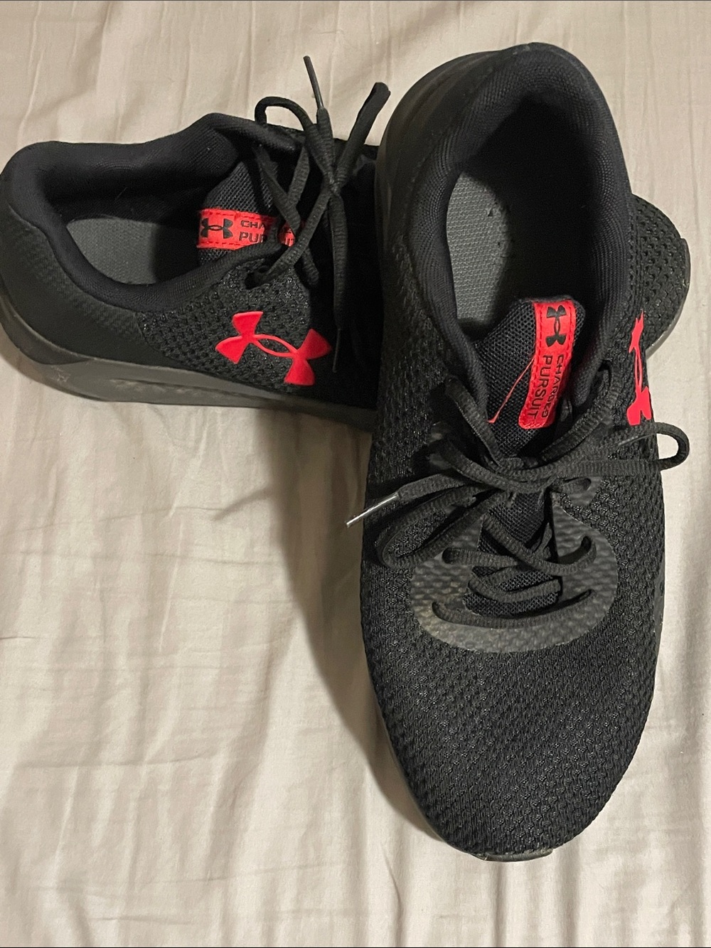 Under Armour Black Charged Pursuit Athletic Trainers with Red Logo Accents